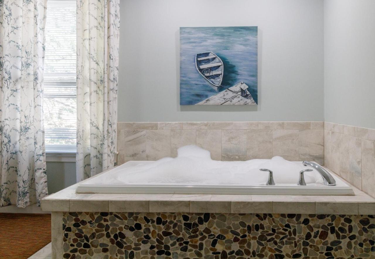 King Jetted Tub and Fireplace Compass Rose Building