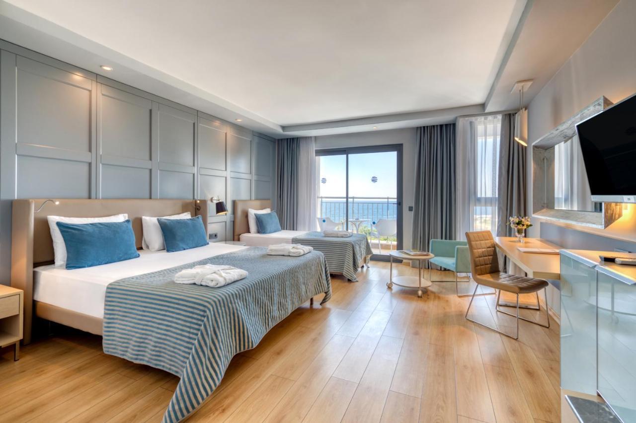Dreibettzimmer mit Meerblick