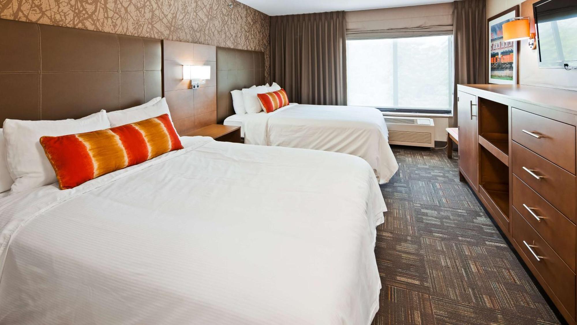 Queen Suite with Two Queen Beds and Sofa Bed