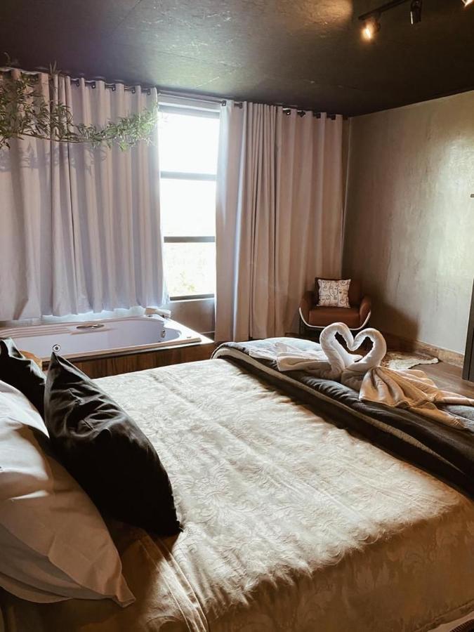 Suíte Deluxe com Banheira de Hidromassagem