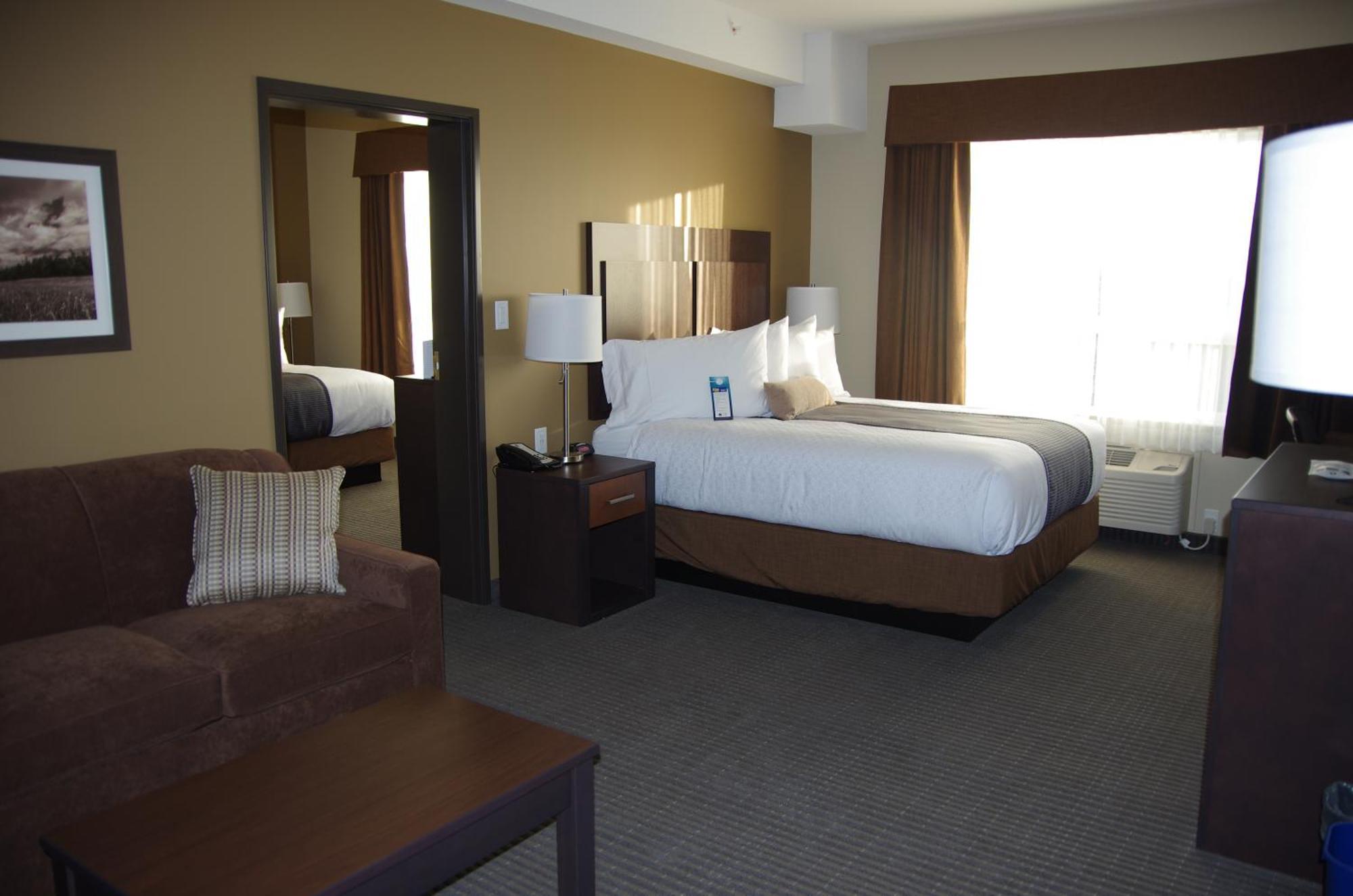 Suite with King Bed, Queen Bed and Sofa Bed