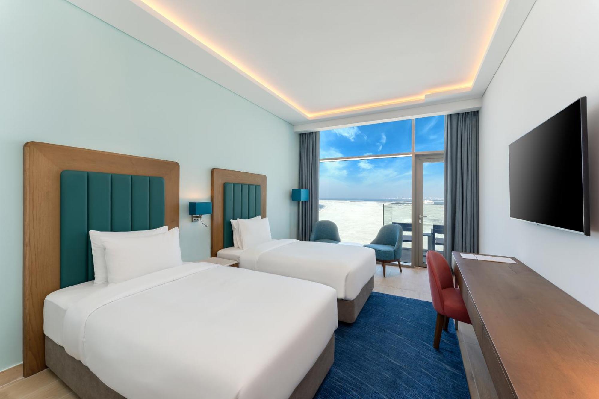 Deluxe Tweepersoonskamer met 2 Aparte Bedden en Uitzicht op Zee