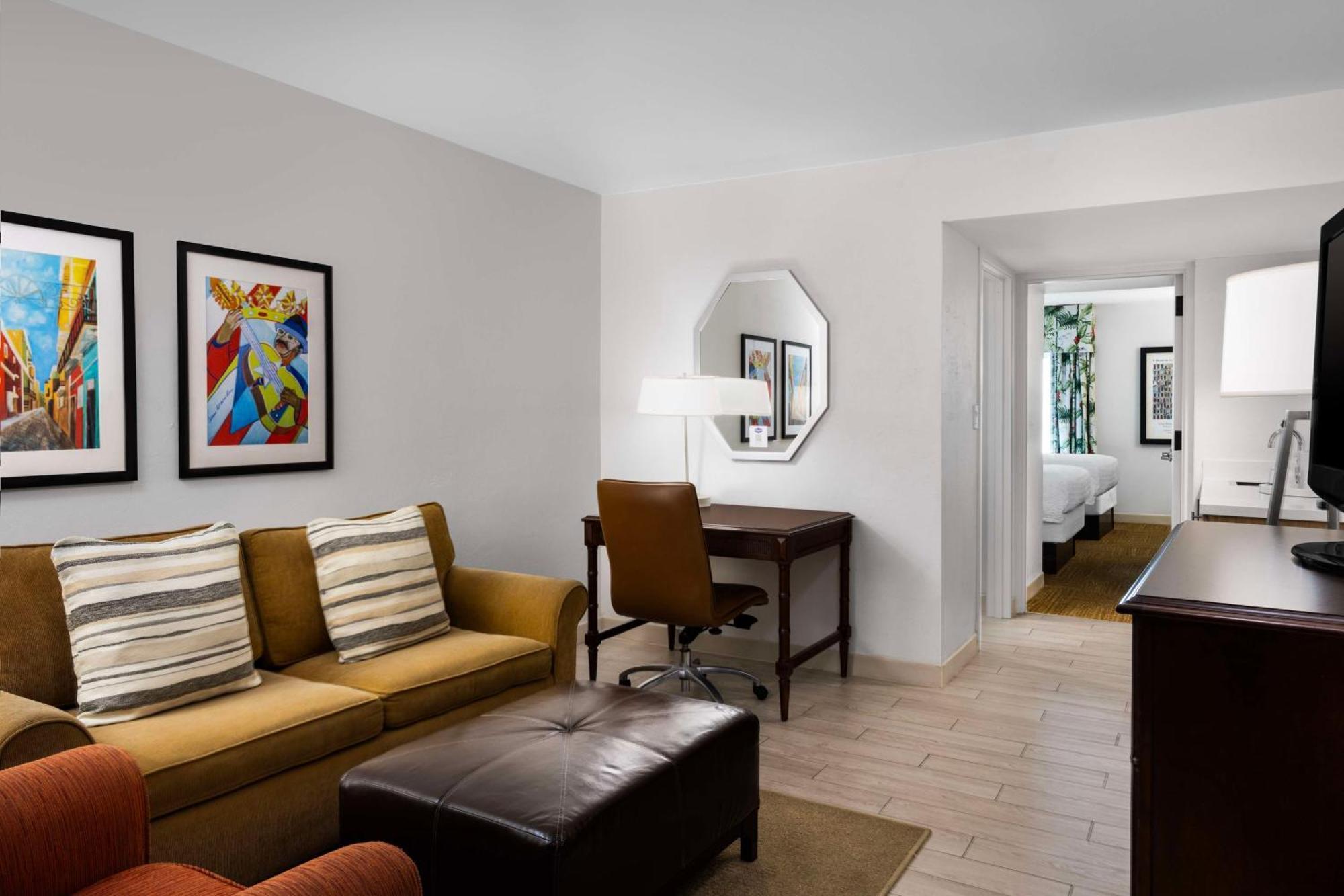 Suite with Two Double Beds and Pool View