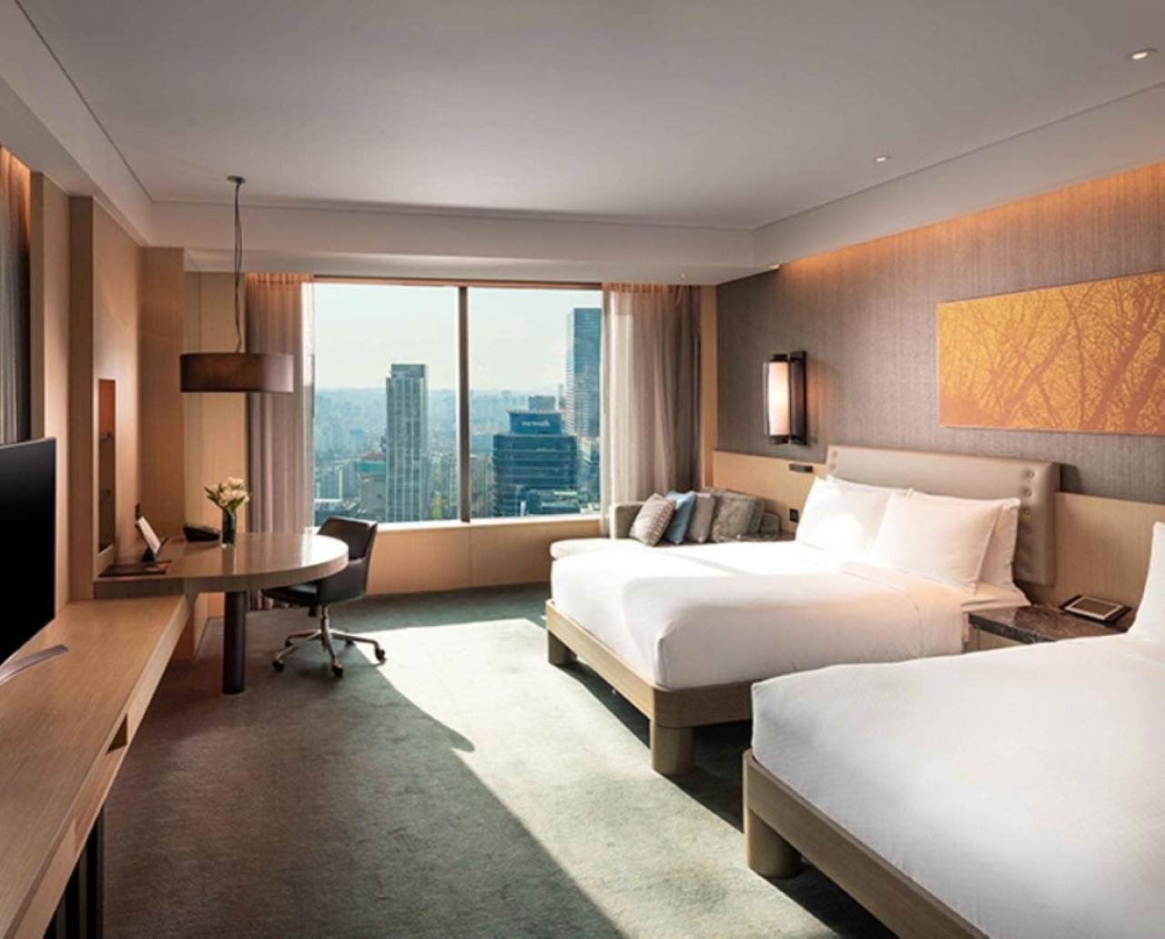 Deluxe Queen Room with Two Queen Beds - City and River View