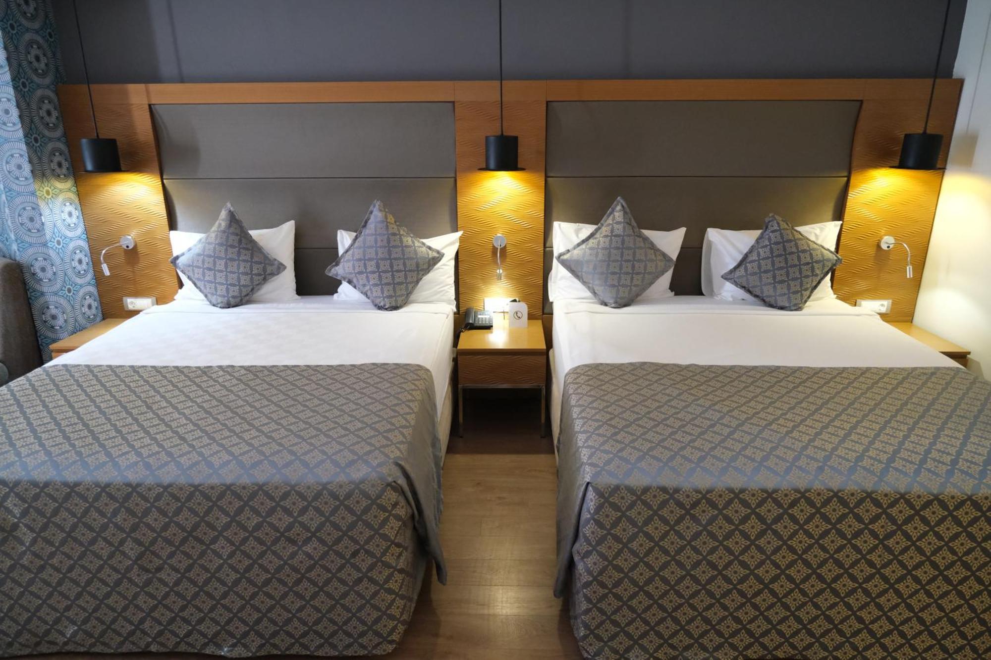 Deluxe Doppel-/Zweibettzimmer mit Balkon