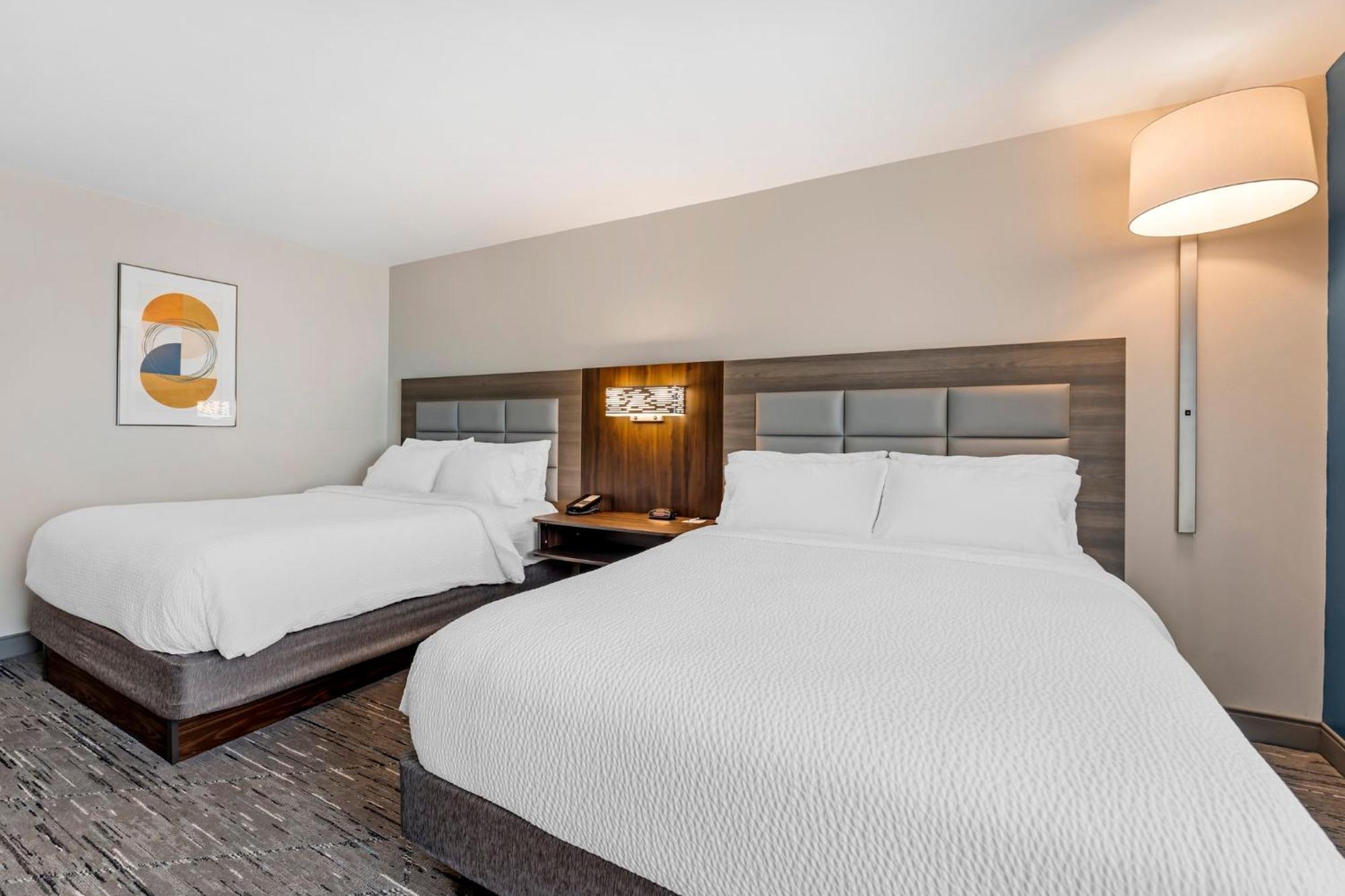 Queen Suite with Two Queen Beds and Sofa Bed