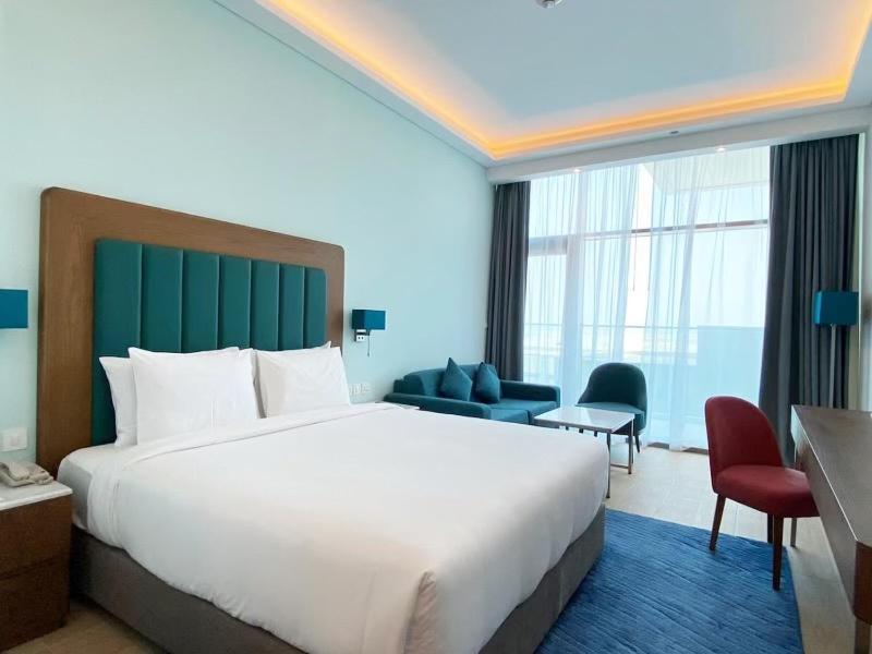 Deluxe tweepersoonskamer met balkon en uitzicht op zee
