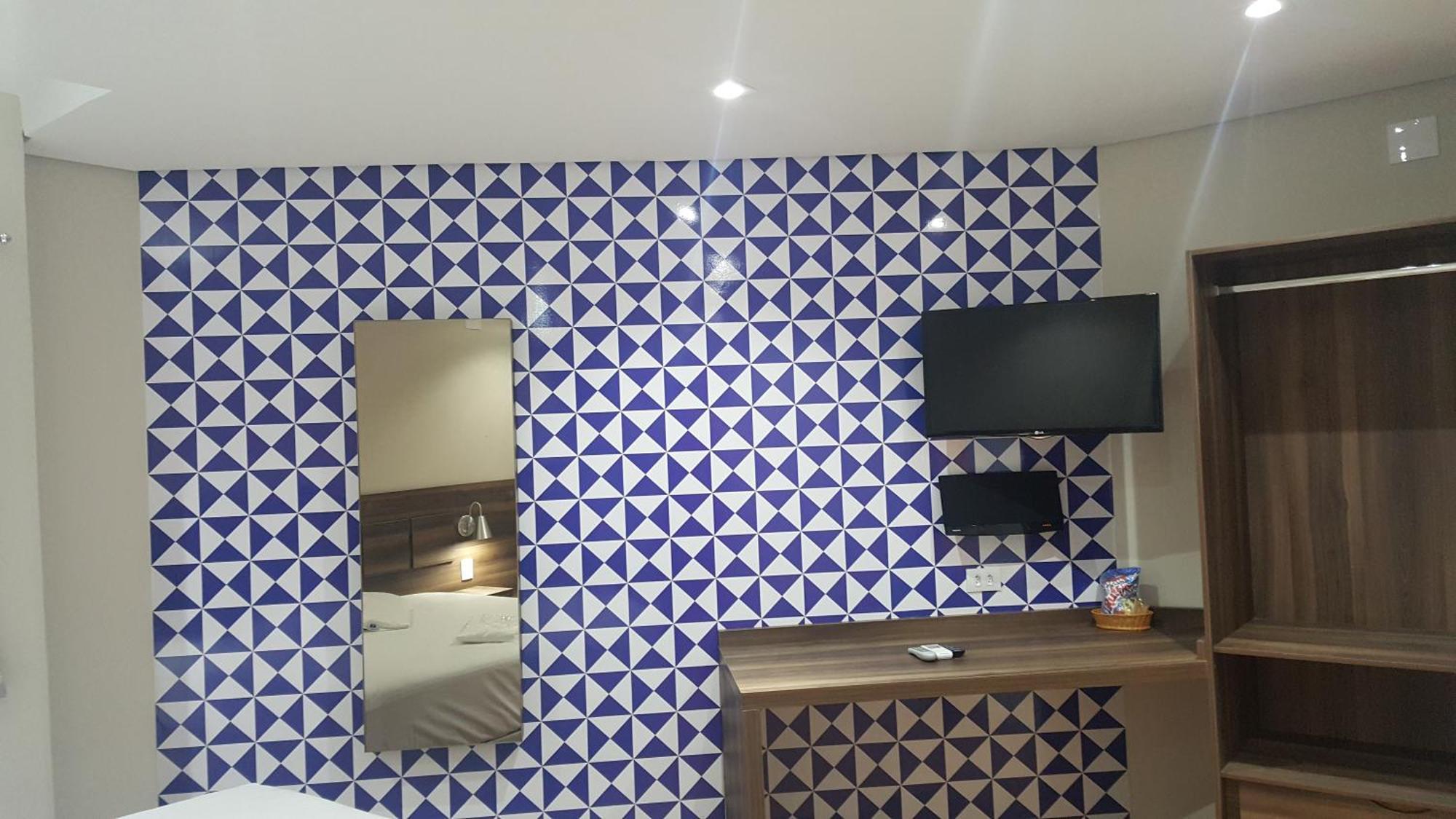 Quarto Duplo com Banheira de Hidromassagem