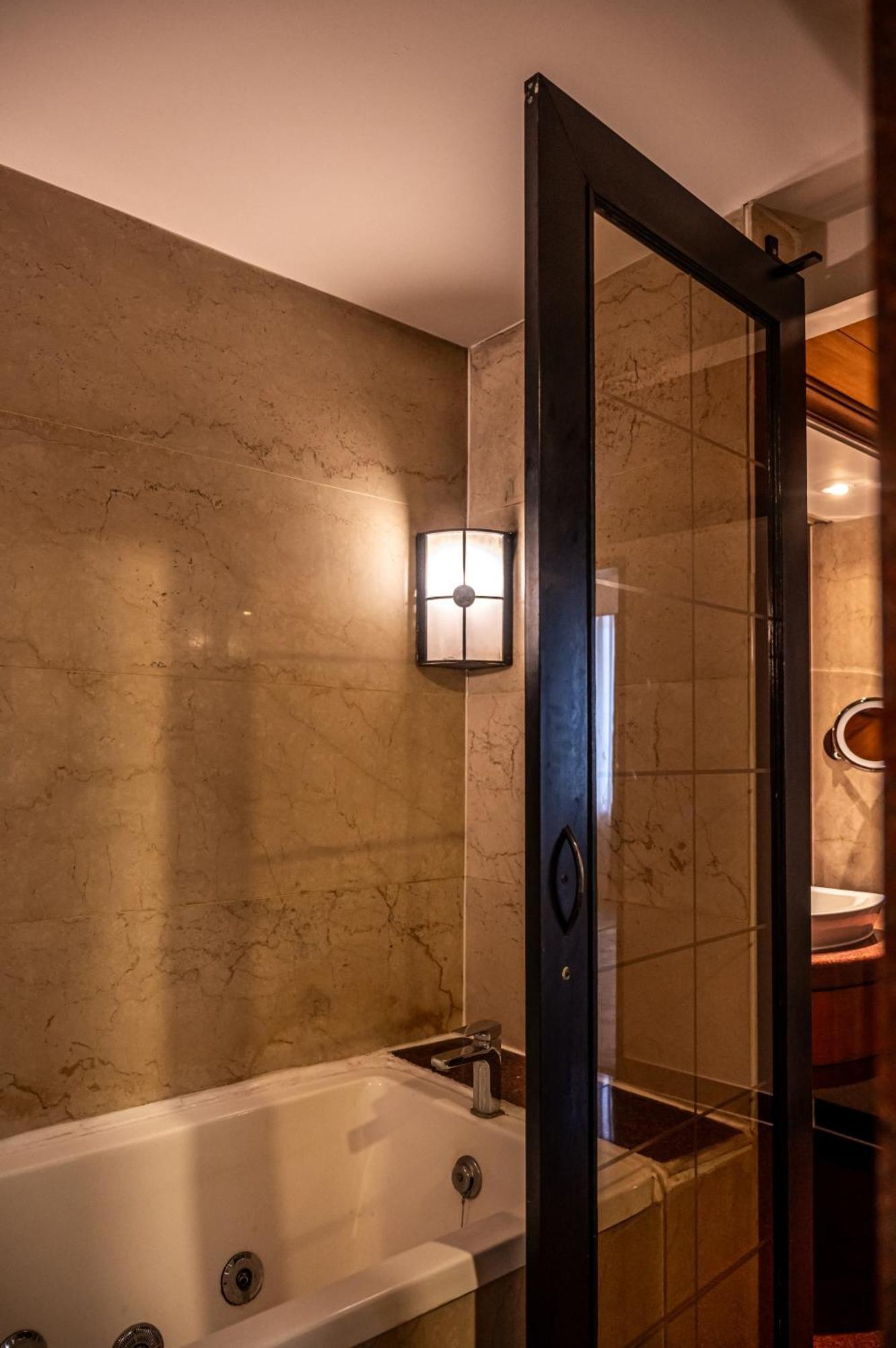 The Residence with In room check In, Welcome drinks on arrival, Happy Hours from 1830 hrs to 2030 hrs at The Residence Lounge, 2pcs ironing complimentary, One way transfer included, One hour business center usage included (prior intimation needed)