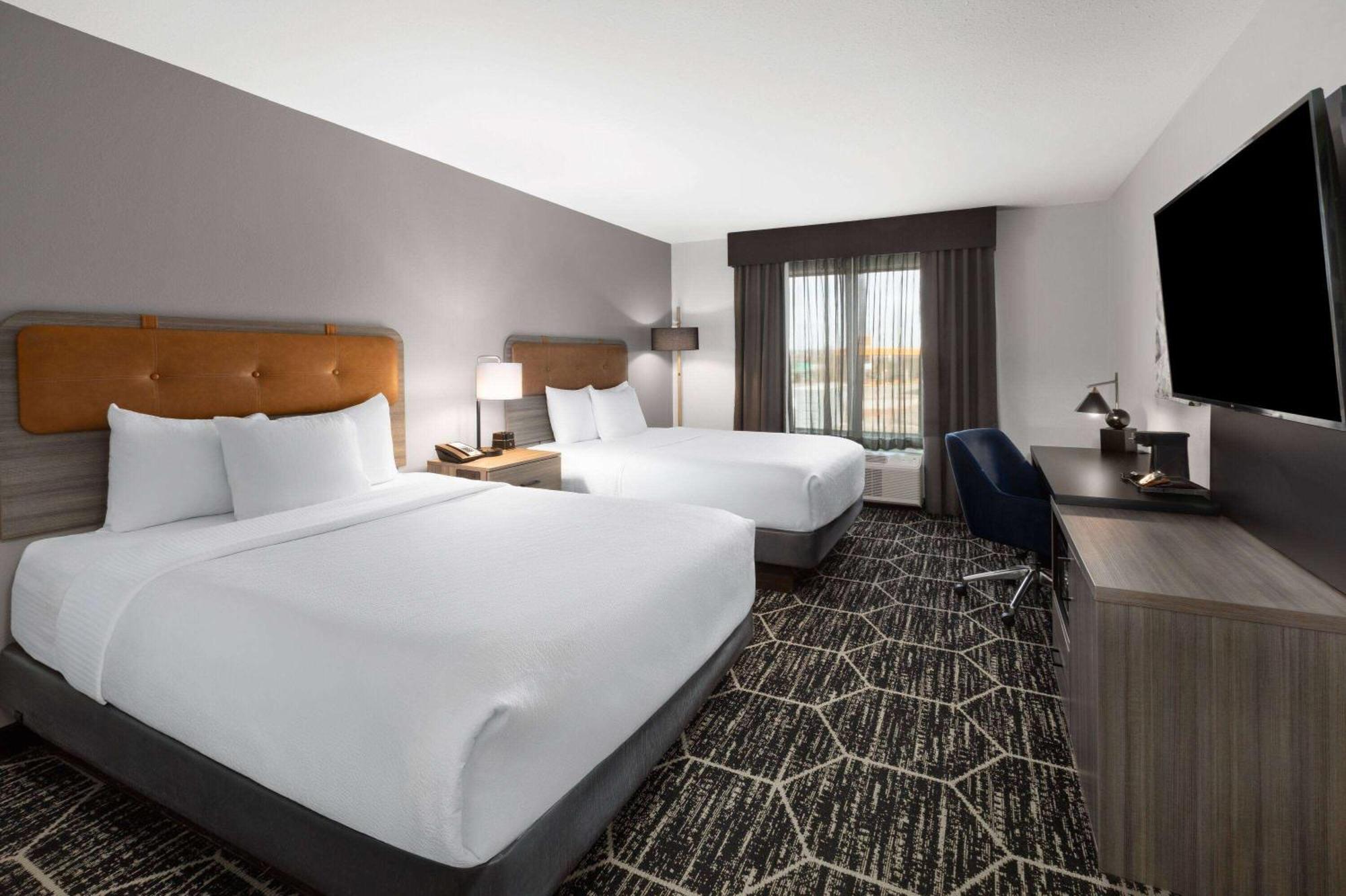 Suite with Two Queen Beds and Sofa Bed - Shower with Grab Bars - Mobility Accessible - Non-Smoking