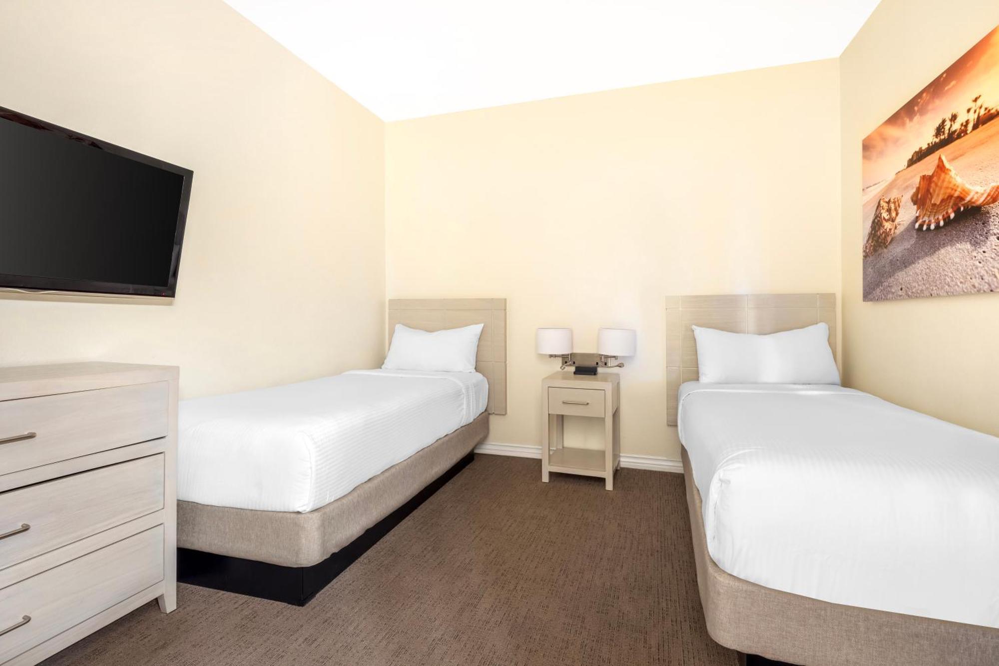 Two-Bedroom Suite with One King Bed and Two Twin Beds