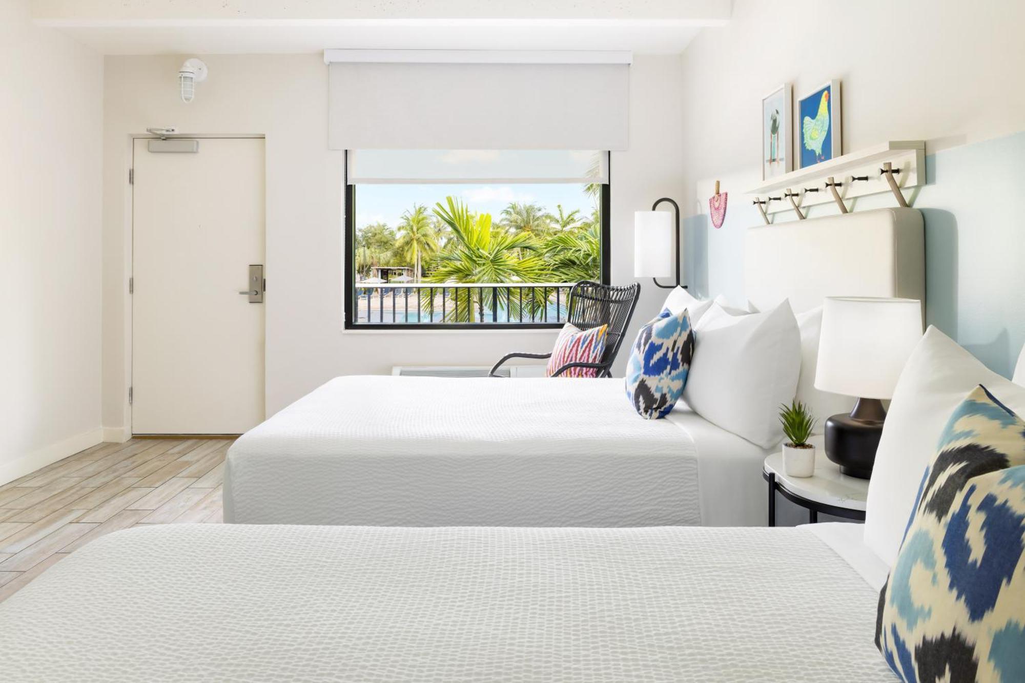 Pool View Two Queen Beds Hearing Accessible