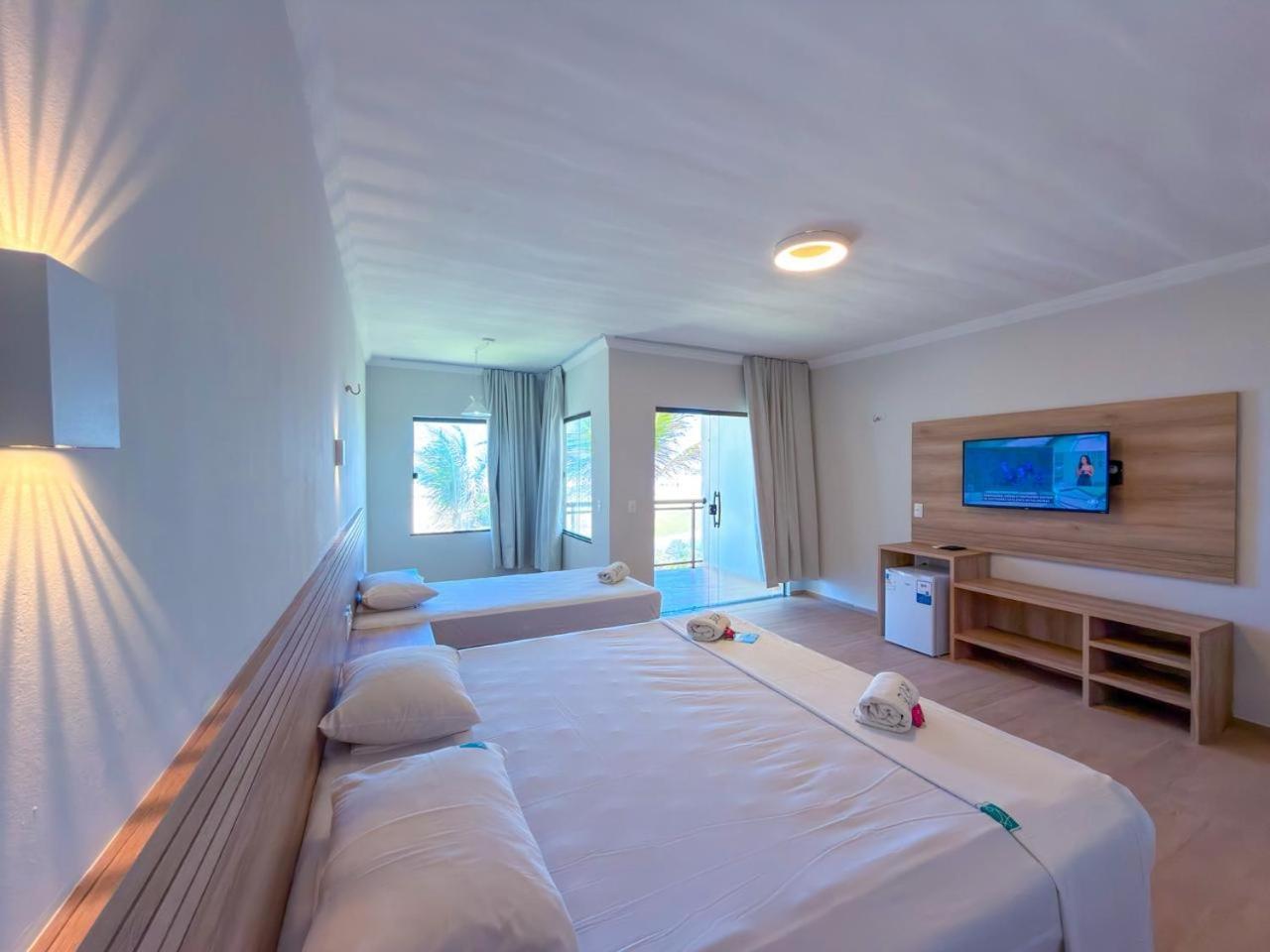 Quarto Triplo Deluxe com Vista do Mar