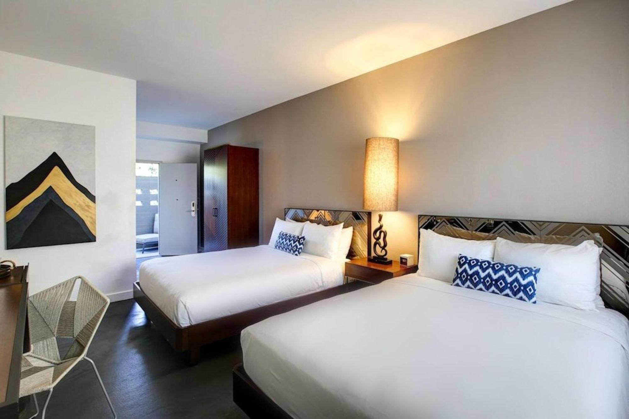 Deluxe Queen Room with Two Queen Beds and Pool View - Non-Smoking
