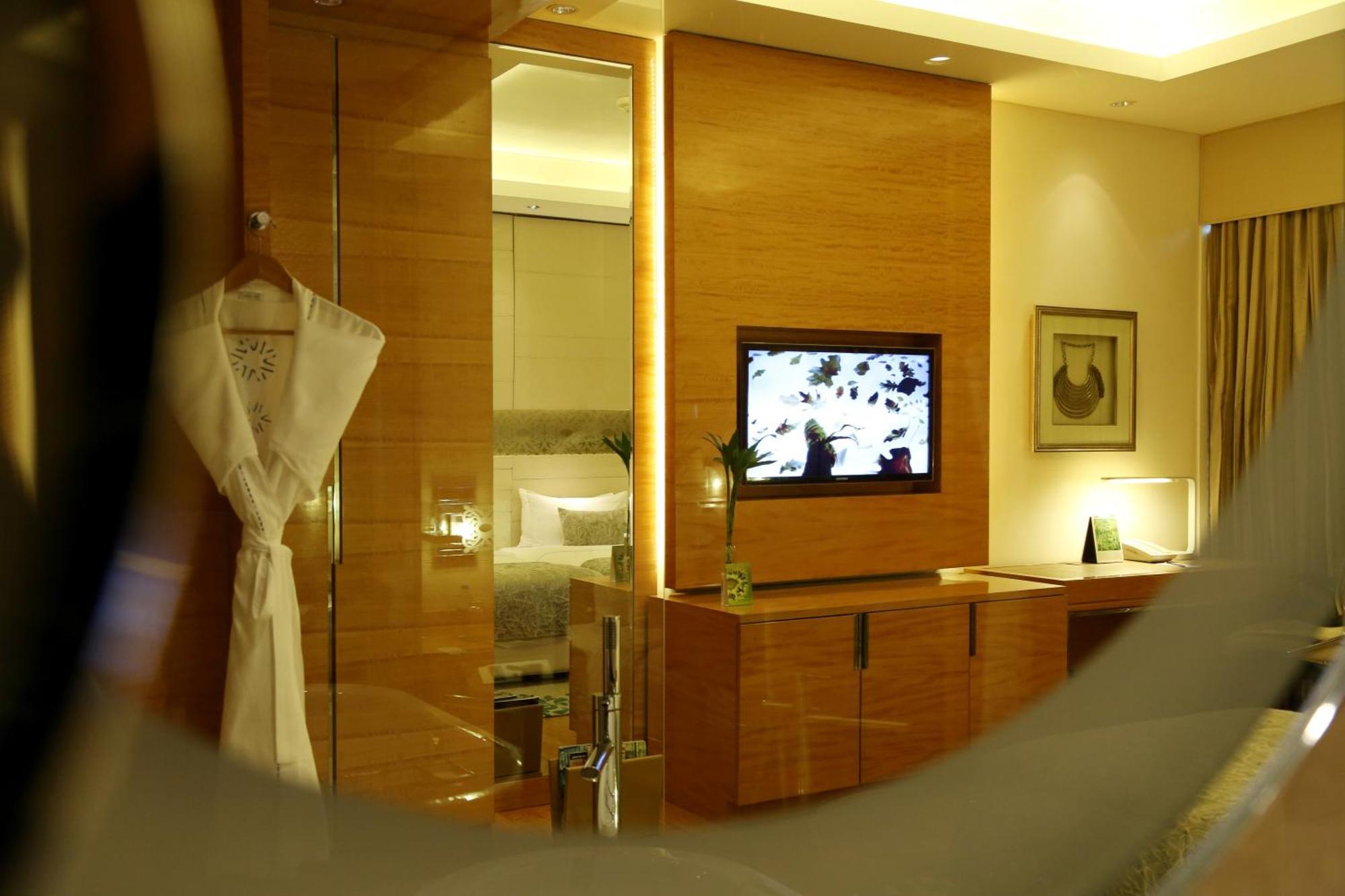 Taj Club Room with One way airport transfer, Butler service on request, 02 Pcs of Ironing per day,20 % disc on FNSB,SPA & transportation, Cocktail Hours @ Club Lounge from 18:00 hrs to 20:00 hrs, 2 hours of boardroom usage per stay subject to availab