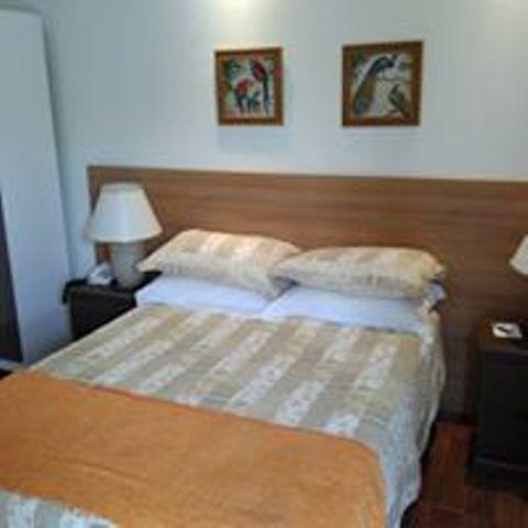 Quarto Duplo