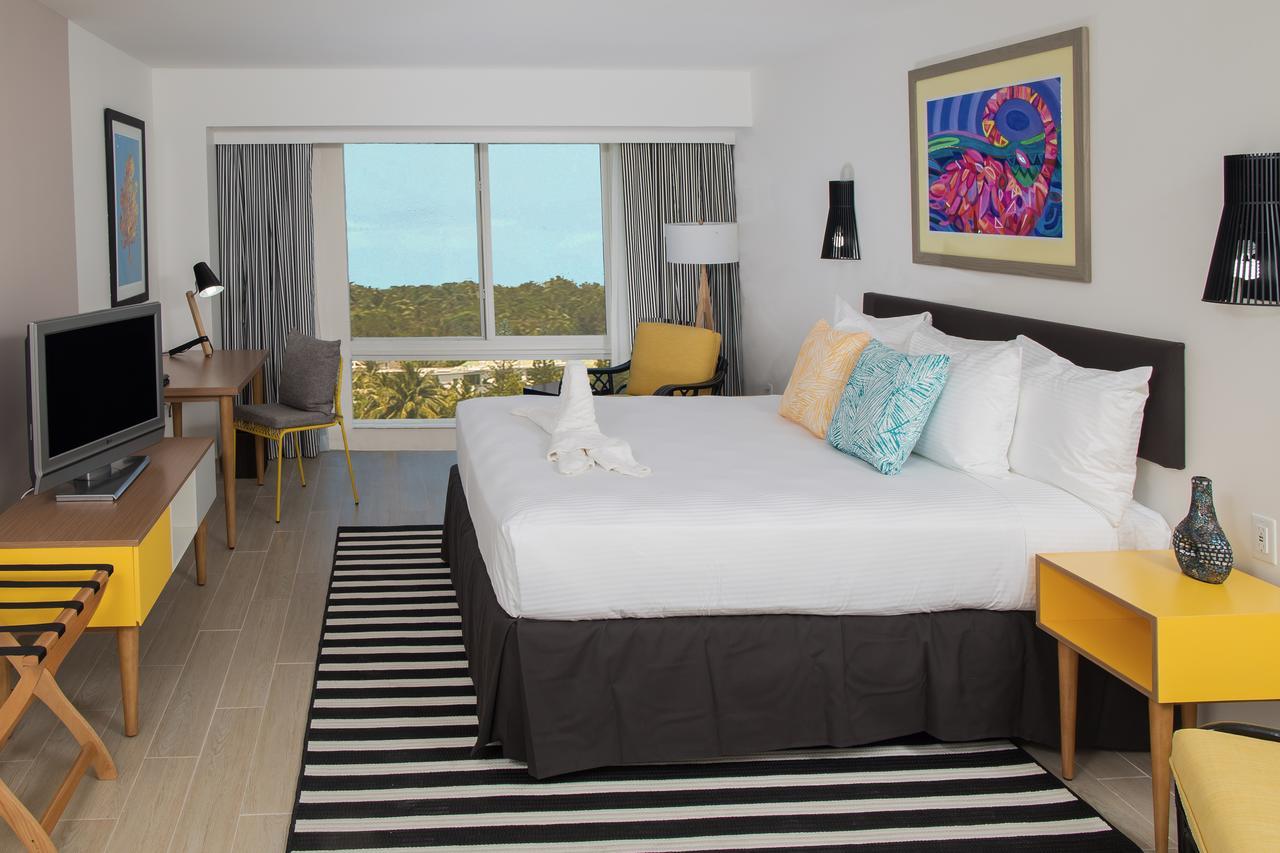 Quarto com Cama King-size e Vista da Ilha - Acessível para Cadeira de Rodas