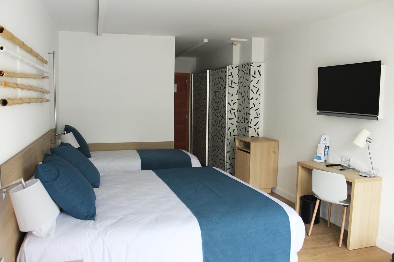 Design Triple Room (2 Adults + 1 Child)