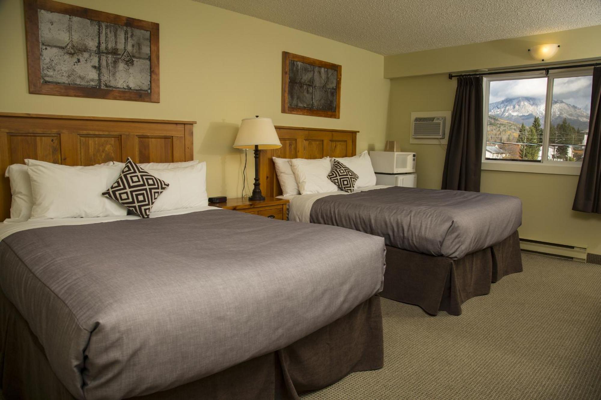 Queen Room with Two Queen Beds and Balcony