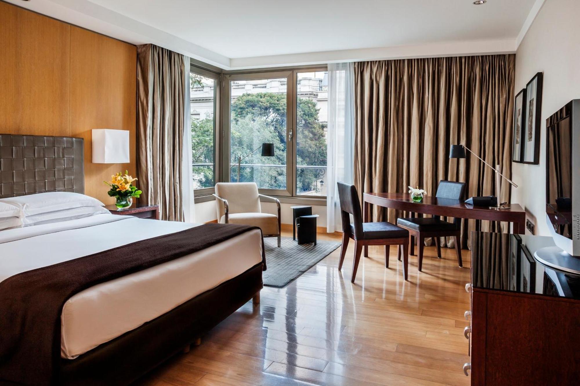 Habitación doble deluxe con cama grande y vistas al jardín
