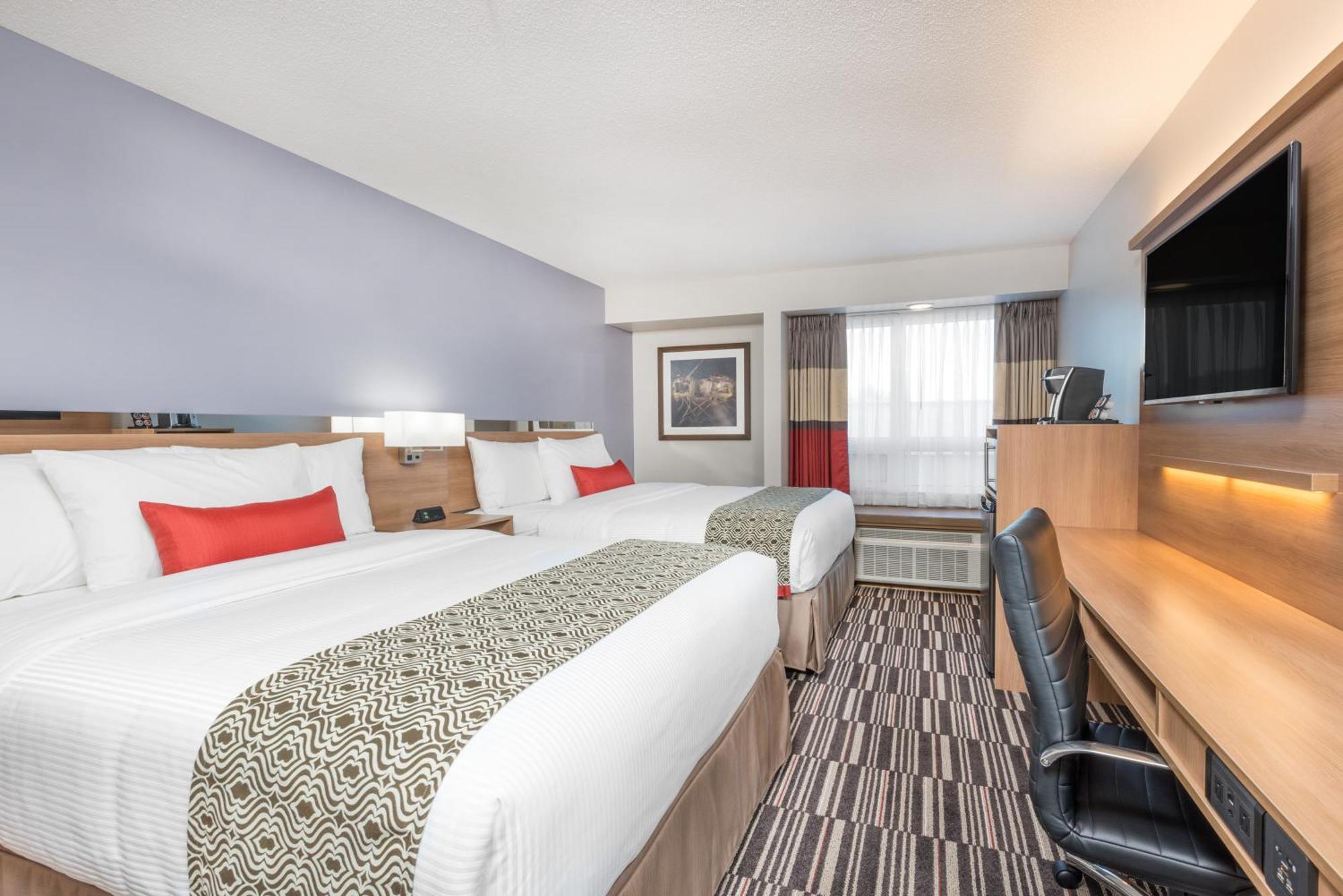 Queen Room with Two Queen Beds and Shower Only - Non-Smoking