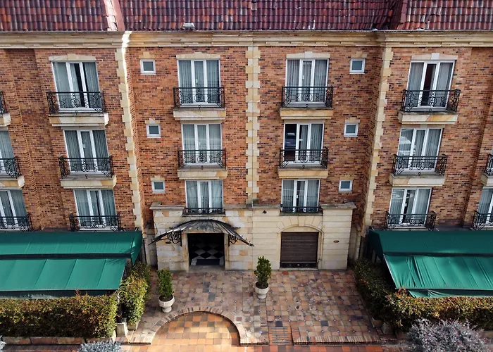 Hotel Windsor House Inn By Geh Suites