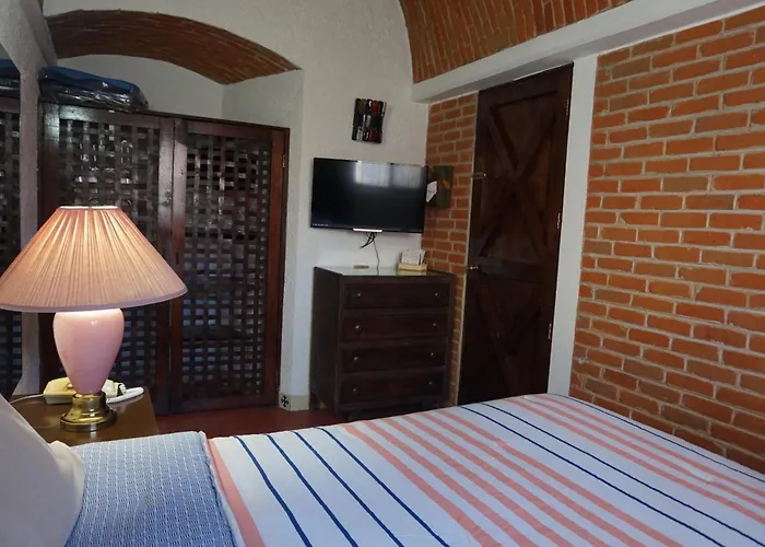 Suites Poza Real