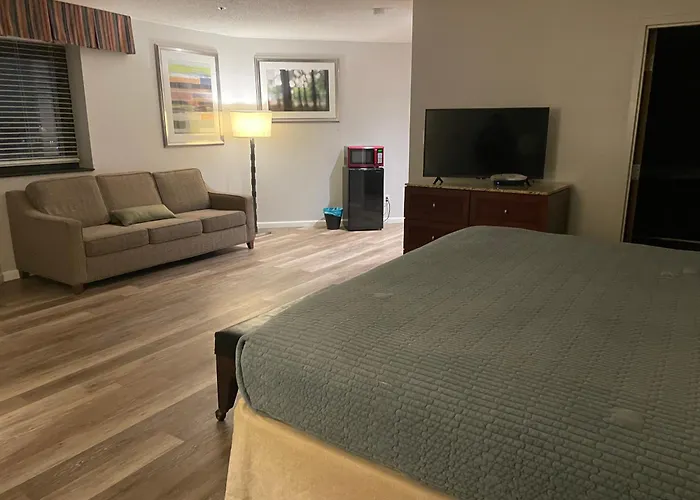Apm Inn & Suites